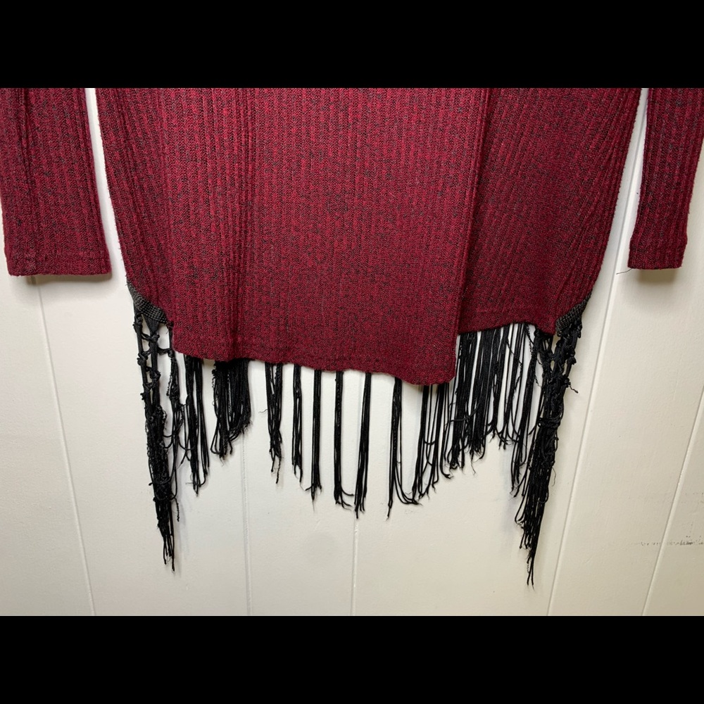 Knitted sweater with dangles at the bottom. - Picture 6 of 6